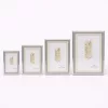 Modern képkeret 20×25 cm – 15×20 cm fotóhoz, szürke–ezüst–bézs színkombinációban