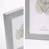Modern képkeret 19×24 cm – 15×20 cm fotóhoz, világosszürke fa hatású kivitelben