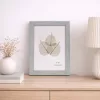 Modern képkeret 19×24 cm – 15×20 cm fotóhoz, világosszürke fa hatású kivitelben